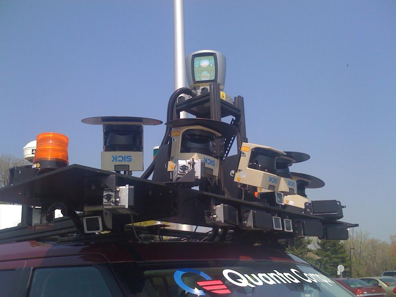 Illustration for article titled DARPA Urban Challenge Cars Invading Pentagon Parking Lot